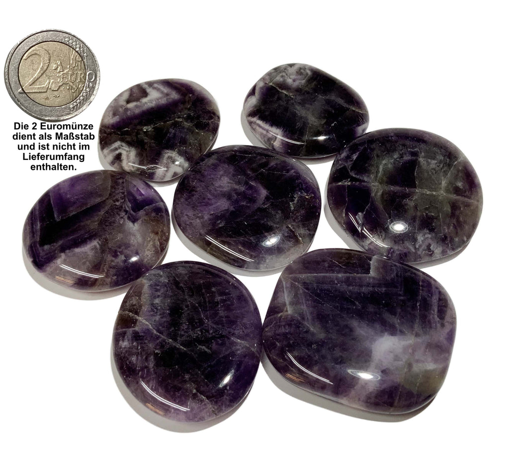 Sammelbild von 7 Amethyst Scheibensteinen mit einer 2Euro Münze als Größenvergleich