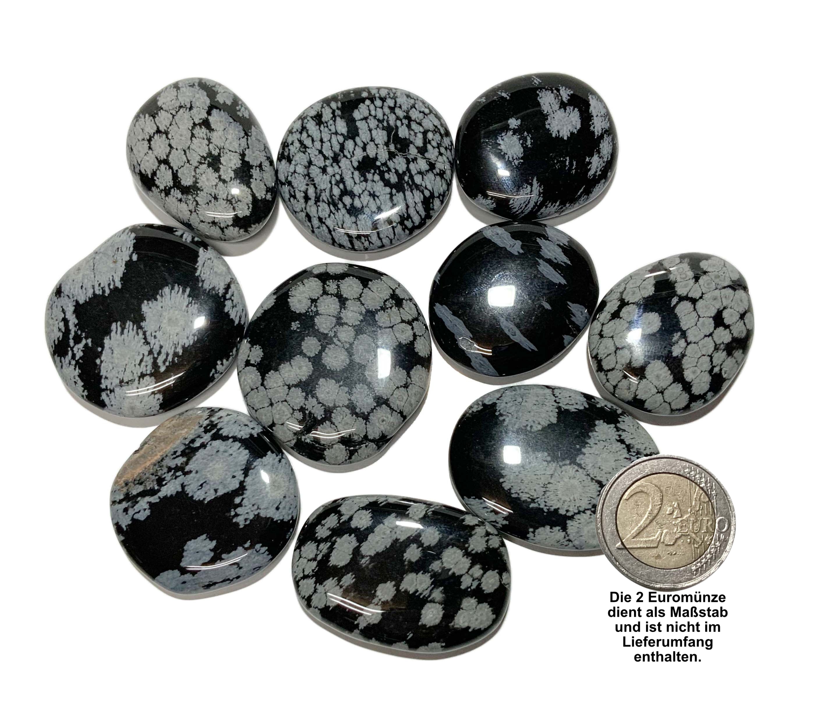 Sammelbild von Schneeflockenobsidian Scheibensteinen mit einer 2EORO Münze als Größenvergleich