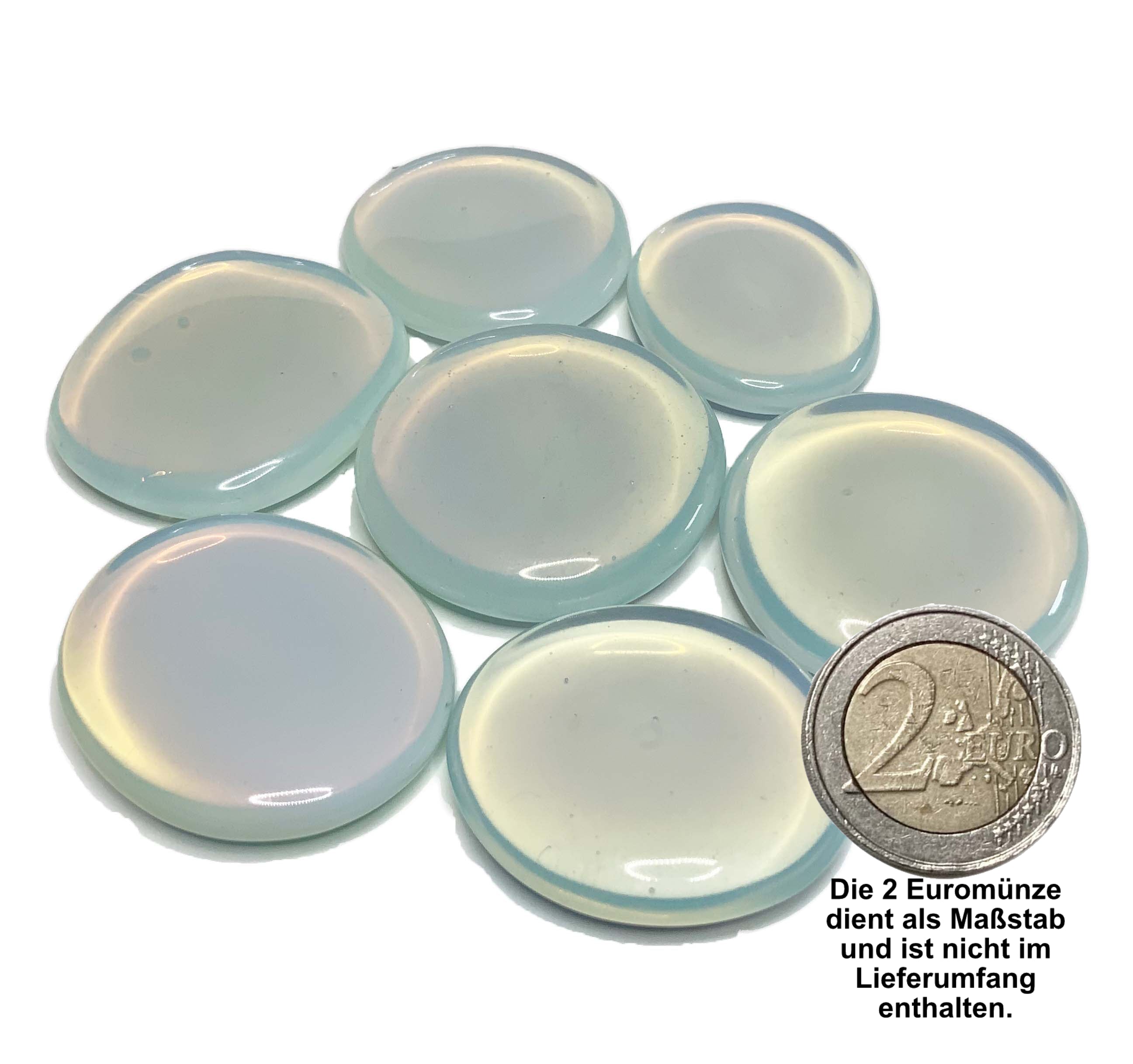 Sammelbild von Opalisierendem Glas Scheibensteinen mit einer 2 EORO Münze als Größenvergleich